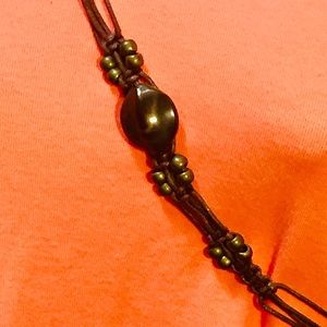 Accessories - A corded brown belt with beads Accessories - A corded brown belt with beads